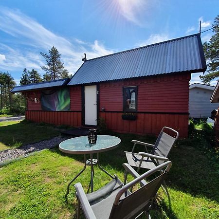 Camp Caroli Wooden Cabins Jukkasjarvi Exterior photo