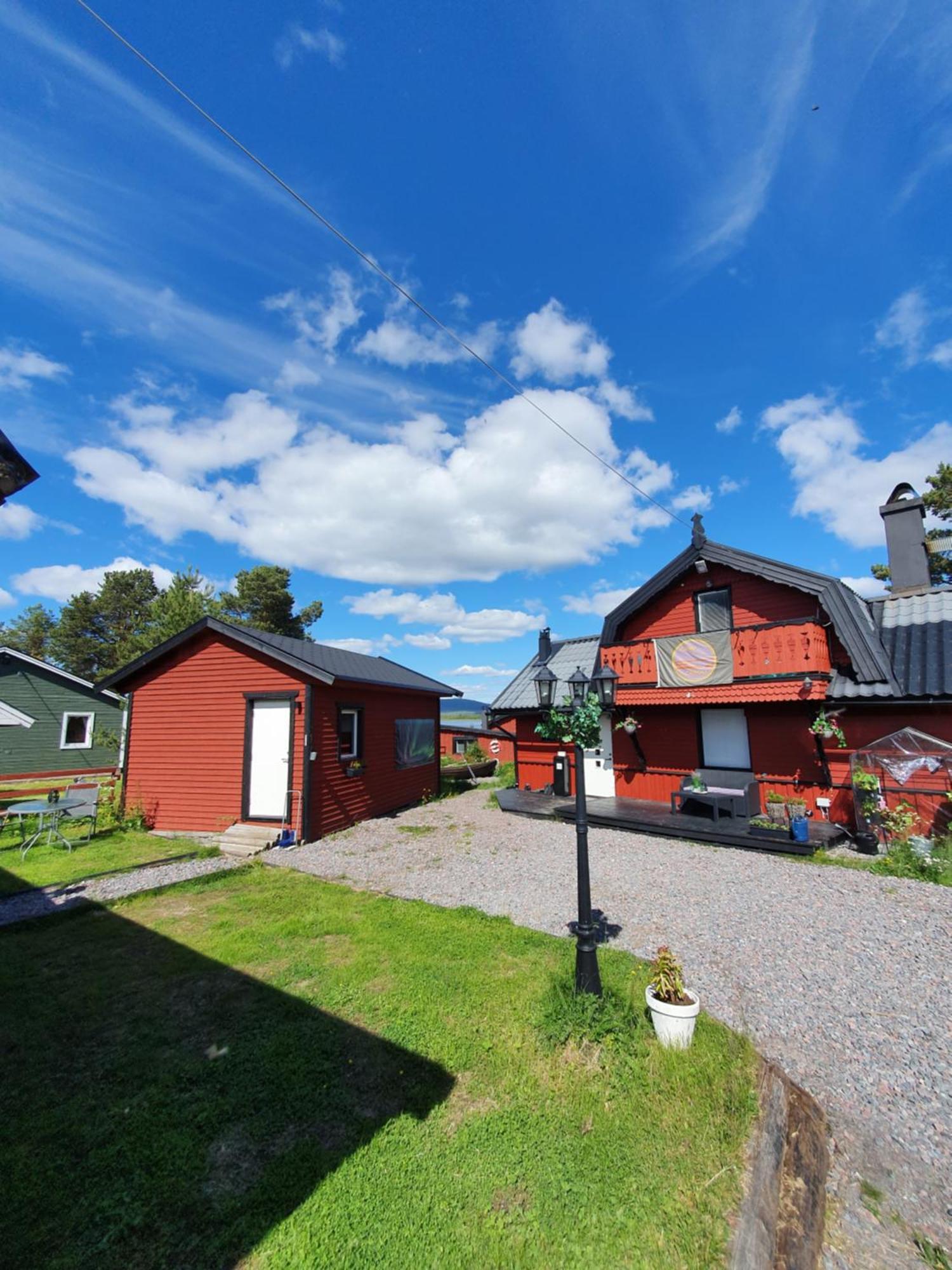 Camp Caroli Wooden Cabins Jukkasjarvi Exterior photo