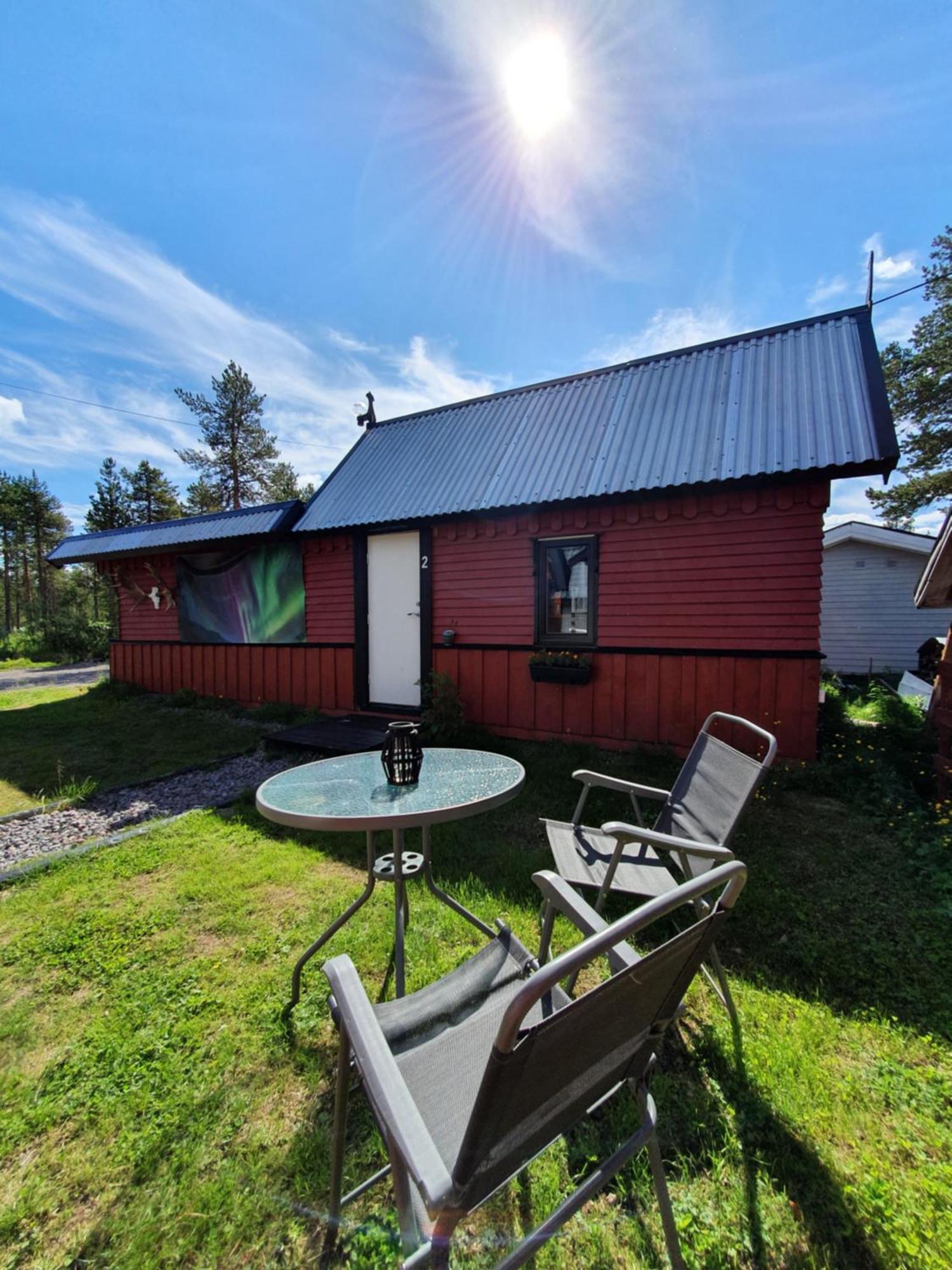 Camp Caroli Wooden Cabins Jukkasjarvi Exterior photo
