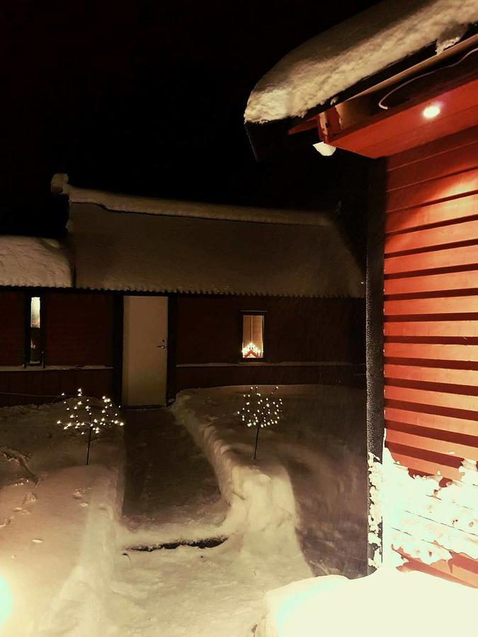 Camp Caroli Wooden Cabins Jukkasjarvi Exterior photo