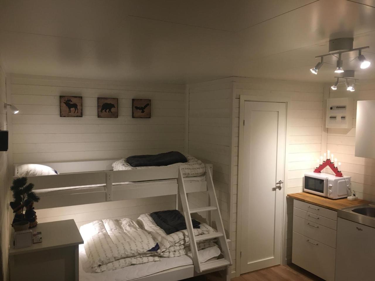 Camp Caroli Wooden Cabins Jukkasjarvi Exterior photo