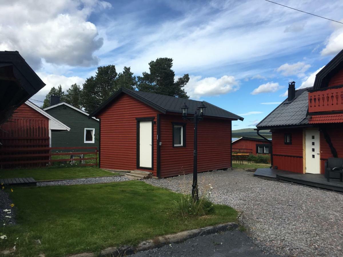 Camp Caroli Wooden Cabins Jukkasjarvi Exterior photo