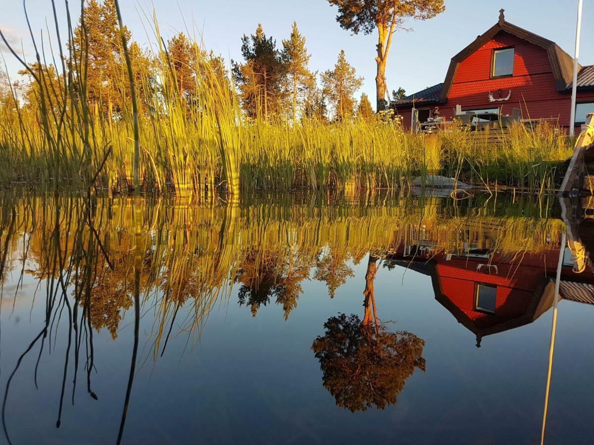 Camp Caroli Wooden Cabins Jukkasjarvi Exterior photo